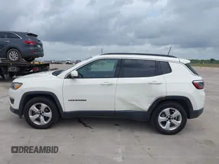 2019 Jeep Compass Latitude with VIN 3C4NJCBB9KT652088, listed as a IAAI auction lot 42162439 with 97,276 mi miles and . Bid and sale history available at DreamBid. Image 14.