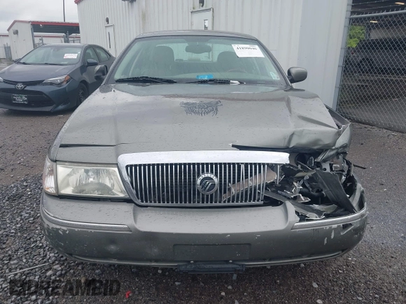 2004 Mercury Grand Marquis LS Premium z VIN 2MEHM75W64X654827, wystawiony jako IAAI lot #41890046 z przebiegiem Nie podano mil oraz . Historia ofert i sprzedaży dostępna na DreamBid. Obrazek 12.