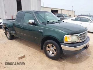 2001 Ford F-150 XL with VIN 1FTZX07271KB88709, listed as a IAAI auction lot 42599181 with 153,985 mi miles and . Bid and sale history available at DreamBid. Image 1.
