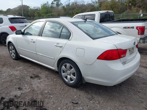 2009 Kia Optima LX z VIN KNAGE228395333286, wystawiony jako IAAI lot #41737577 z przebiegiem 113 152 mil mil oraz . Historia ofert i sprzedaży dostępna na DreamBid. Obrazek 3.