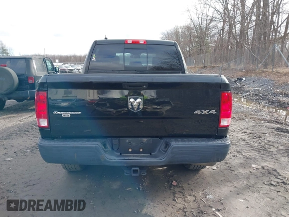 2015 Ram 1500 Outdoorsman with VIN 1C6RR7LTXFS652897, listed as a IAAI auction lot 41913742 with 90,920 mi miles and . Bid and sale history available at DreamBid. Image 16.