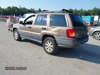 2001 Jeep Grand Cherokee Laredo with VIN 1J4GW48S31C626727, listed as a IAAI auction lot 42796974 with 132,988 mi miles and . Bid and sale history available at DreamBid. Image 3.