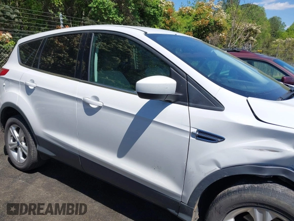 2015 Ford Escape SE with VIN 1FMCU0G97FUB08702, listed as a IAAI auction lot 42045471 with 190,782 mi miles and . Bid and sale history available at DreamBid. Image 13.