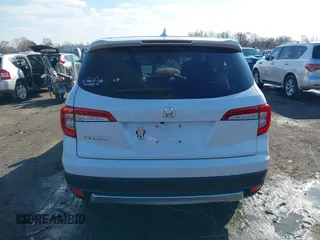 2021 Honda Pilot EX-L with VIN 5FNYF5H57MB037861, listed as a IAAI auction lot 41566924 with 42,867 mi miles. Bid and sale history available at carsss.com. Image 16.