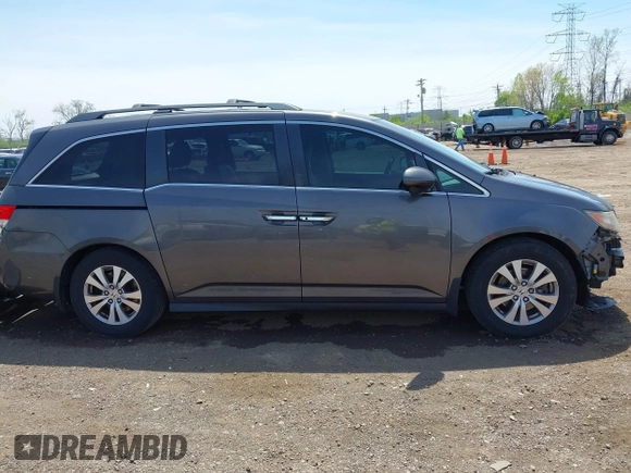 2016 Honda Odyssey SE with VIN 5FNRL5H34GB043343, listed as a IAAI auction lot 42096360 with 140,878 mi miles and . Bid and sale history available at DreamBid. Image 14.