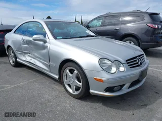 2004 Mercedes-Benz CLK-Class 5.0L with VIN WDBTJ75J34F071716, listed as a IAAI auction lot 41818093 with 100,142 mi miles. Bid and sale history available at carsss.com. Image 1.