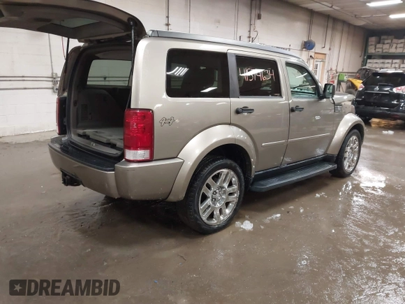 2007 Dodge Nitro SLT z VIN 1D8GU58K57W673543, wystawiony jako IAAI lot #41574634 z przebiegiem 64 286 mil mil oraz . Historia ofert i sprzedaży dostępna na DreamBid. Obrazek 4.