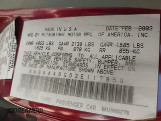 2002 Mitsubishi Galant ES with VIN 4A3AA46G52E117959, listed as a IAAI auction lot 41590791 with 135,310 mi miles. Bid and sale history available at carsss.com. Image 9.