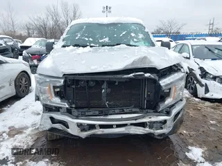 2018 Ford F-150 XL with VIN 1FTFW1E54JKC59793, listed as a IAAI auction lot 41558134 with 217,831 mi miles. Bid and sale history available at carsss.com. Image 12.