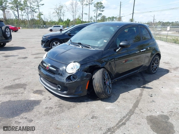 2013 FIAT 500 Abarth with VIN 3C3CFFFH6DT534970, listed as a IAAI auction lot 41806231 with 140,649 mi miles. Bid and sale history available at carsss.com. Image 17.