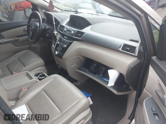2011 Honda Odyssey EX-L with VIN 5FNRL5H68BB054204, listed as a IAAI auction lot 42576248 with Not provided miles and . Bid and sale history available at DreamBid. Image 5.
