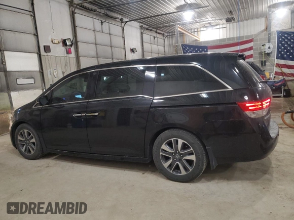 2014 Honda Odyssey Touring z VIN 5FNRL5H91EB128917, wystawiony jako Copart lot #49353085 z przebiegiem 208 871 mil mil oraz Czysty tytuł • Clean title. Historia ofert i sprzedaży dostępna na DreamBid. Obrazek 2.