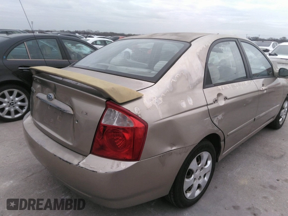2004 Kia Spectra LX with VIN KNAFE121545043455, listed as a IAAI auction lot 41441356 with 189,566 mi miles. Bid and sale history available at carsss.com. Image 4.