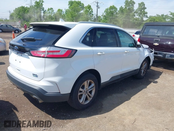2020 Ford Edge SEL z VIN 2FMPK4J90LBA28960, wystawiony jako IAAI lot #42264189 z przebiegiem 91 312 mil mil oraz . Historia ofert i sprzedaży dostępna na DreamBid. Obrazek 4.