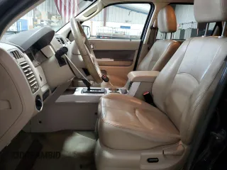 2009 Mercury Mariner Premier with VIN 4M2CU97G39KJ24459, listed as a Copart auction lot 83041574 with 123,437 mi miles and Salvage Title. Bid and sale history available at carsss.com. Image 7.