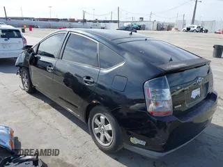 2006 Toyota Prius with VIN JTDKB20UX67525780, listed as a IAAI auction lot 42055112 with 157,100 mi miles. Bid and sale history available at carsss.com. Image 3.