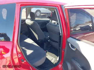 2009 Honda Fit with VIN JHMGE88219S036655, listed as a IAAI auction lot 41879820 with 209,454 mi miles. Bid and sale history available at carsss.com. Image 8.