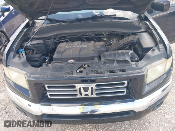 2006 Honda Ridgeline RTL with VIN 2HJYK165X6H558475, listed as a IAAI auction lot 42555097 with 180,711 mi miles and . Bid and sale history available at DreamBid. Image 10.
