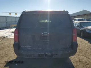 2015 Chevrolet Suburban LT with VIN 1GNSKJKC2FR274506, listed as a Copart auction lot 87881695 with 196,506 mi miles and Salvage Title. Bid and sale history available at DreamBid. Image 6.