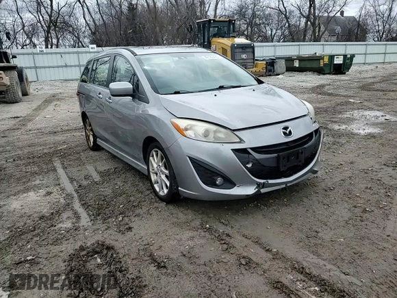 2012 Mazda 5 Grand Touring z VIN JM1CW2DL1C0142406, wystawiony jako Copart lot #48186495 z przebiegiem 198 419 mil mil oraz Nie do naprawy • Non repairable. Historia ofert i sprzedaży dostępna na DreamBid. Obrazek 13.