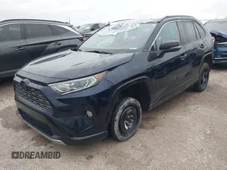 2021 Toyota RAV4 Hybrid XSE with VIN 2T3E6RFV5MW002856, listed as a IAAI auction lot 42387921 with Not provided miles and . Bid and sale history available at DreamBid. Image 2.