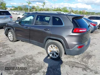 2016 Jeep Cherokee Altitude with VIN 1C4PJLCSXGW363598, listed as a IAAI auction lot 41670125 with 135,603 mi miles. Bid and sale history available at carsss.com. Image 3.