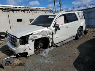 2015 GMC Yukon SLT with VIN 1GKS2BKC3FR143491, listed as a Copart auction lot 76062044 with Not Provided miles and Salvage Title. Bid and sale history available at carsss.com. Image 1.