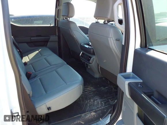 2023 Ford F-150 Lightning Pro with VIN 1FTVW1EL2PWG18764, listed as a IAAI auction lot 41908278 with 16,276 mi miles and . Bid and sale history available at DreamBid. Image 8.