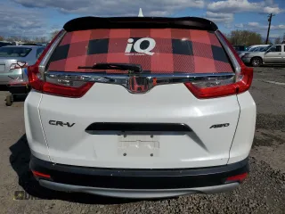 2019 Honda CR-V LX z VIN 5J6RW6H35KL004807, wystawiony jako Copart lot #51943275 z przebiegiem 119 862 mil mil oraz Szkoda całkowita • Salvage title. Historia ofert i sprzedaży dostępna na DreamBid. Obrazek 6.