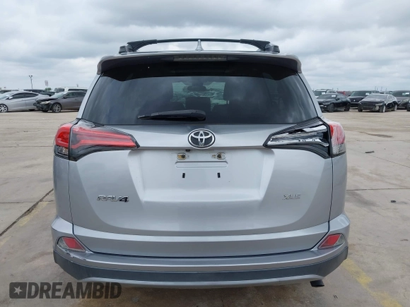 2017 Toyota RAV4 XLE with VIN 2T3WFREV3HW321796, listed as a IAAI auction lot 42080479 with 104,014 mi miles and . Bid and sale history available at DreamBid. Image 16.