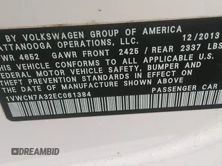 2014 Volkswagen Passat SEL Premium z VIN 1VWCN7A32EC061384, wystawiony jako IAAI lot #42210170 z przebiegiem 152 836 mil mil oraz . Historia ofert i sprzedaży dostępna na DreamBid. Obrazek 9.