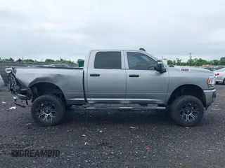 2023 Ram 2500 Tradesman with VIN 3C6UR5CJXPG590942, listed as a IAAI auction lot 42587742 with 76,595 mi miles and . Bid and sale history available at DreamBid. Image 13.
