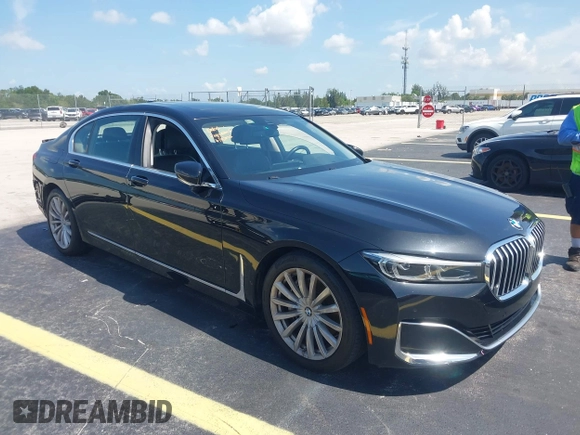 2022 BMW 7 Series 740i with VIN WBA7T2C02NCH73426, listed as a IAAI auction lot 42641007 with 49,300 mi miles and . Bid and sale history available at DreamBid. Image 1.