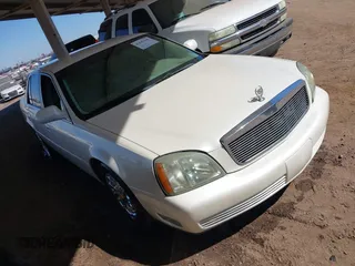 2003 Cadillac DeVille with VIN 1G6KD54Y53U220034, listed as a IAAI auction lot 41641840 with 202,202 mi miles. Bid and sale history available at carsss.com. Image 1.