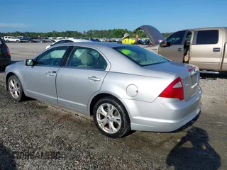 2012 Ford Fusion SE with VIN 3FAHP0HAXCR417311, listed as a IAAI auction lot 42548996 with 131,351 mi miles and . Bid and sale history available at DreamBid. Image 3.