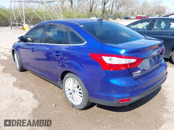 2012 Ford Focus SEL with VIN 1FAHP3H25CL283610, listed as a IAAI auction lot 41973385 with 160,732 mi miles. Bid and sale history available at carsss.com. Image 3.