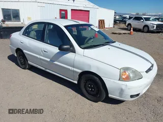 2003 Kia Rio with VIN KNADC125836211761, listed as a IAAI auction lot 41637622 with 117,010 mi miles. Bid and sale history available at carsss.com. Image 1.
