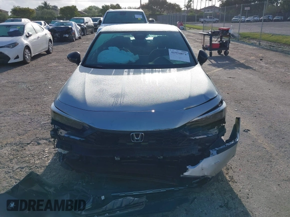 2025 Honda Civic Sport z VIN 2HGFE2F57SH519010, wystawiony jako IAAI lot #41934874 z przebiegiem 7999 mil mil oraz . Historia ofert i sprzedaży dostępna na DreamBid. Obrazek 12.