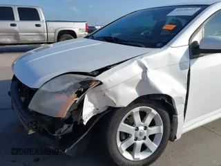 2012 Nissan Sentra SR with VIN 3N1AB6AP6CL623744, listed as a IAAI auction lot 42150852 with 106,383 mi miles and . Bid and sale history available at DreamBid. Image 6.