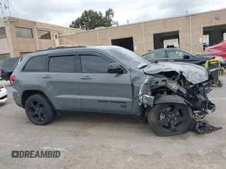 2021 Jeep Grand Cherokee Laredo X z VIN 1C4RJFAG3MC810374, wystawiony jako IAAI lot #41976253 z przebiegiem Nie podano mil oraz . Historia ofert i sprzedaży dostępna na DreamBid. Obrazek 14.
