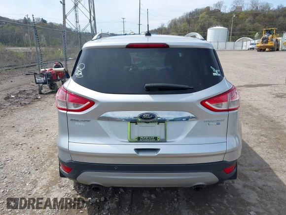 2016 Ford Escape Titanium with VIN 1FMCU9JX3GUA62802, listed as a IAAI auction lot 42001690 with 124,452 mi miles. Bid and sale history available at carsss.com. Image 16.