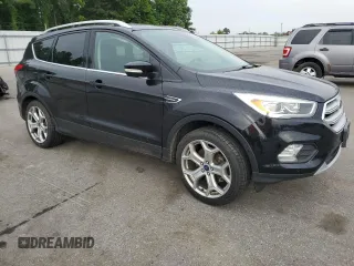 2019 Ford Escape Titanium with VIN 1FMCU0J95KUB14713, listed as a Copart auction lot 55887895 with 85,414 mi miles and Salvage title. Bid and sale history available at DreamBid. Image 4.