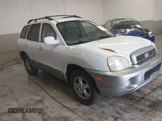 2004 Hyundai Santa Fe GLS with VIN KM8SC13E44U797943, listed as a IAAI auction lot 41731356 with 184,139 mi miles. Bid and sale history available at carsss.com. Image 1.