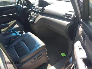 2012 Honda Odyssey Touring with VIN 5FNRL5H90CB099519, listed as a IAAI auction lot 41854550 with 185,110 mi miles. Bid and sale history available at carsss.com. Image 5.
