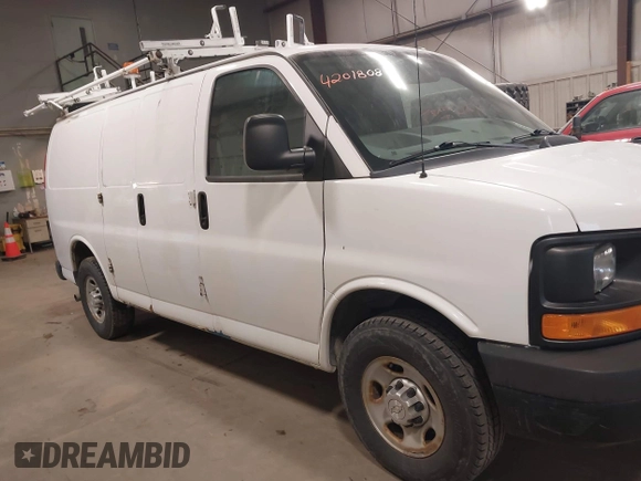 2015 Chevrolet Express Cargo Van with VIN 1GCWGFCF9F1167677, listed as a IAAI auction lot 42018087 with 148,263 mi miles. Bid and sale history available at carsss.com. Image 13.