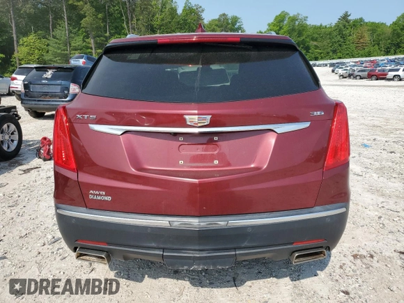 2017 Cadillac XT5 Premium Luxury AWD with VIN 1GYKNERS1HZ112898, listed as a Copart auction lot 58984795 with 140,803 mi miles and Salvage title. Bid and sale history available at DreamBid. Image 6.