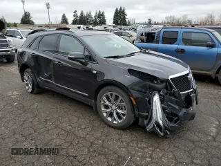 2021 Cadillac XT5 AWD Sport z VIN 1GYKNGRS3MZ158562, wystawiony jako Copart lot #43593295 z przebiegiem 32 293 mil mil oraz Szkoda całkowita • Salvage title. Historia ofert i sprzedaży dostępna na DreamBid. Obrazek 4.