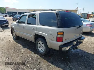 2004 Chevrolet Tahoe LT with VIN 1GNEK13Z64J292910, listed as a IAAI auction lot 42570170 with 309,679 mi miles and . Bid and sale history available at DreamBid. Image 3.