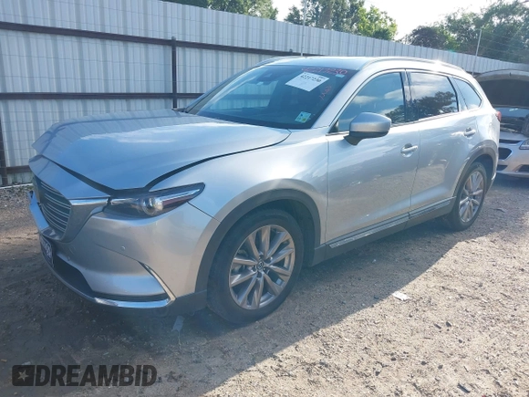 2020 Mazda CX-9 Grand Touring with VIN JM3TCADY2L0406173, listed as a IAAI auction lot 42217230 with 110,465 mi miles and . Bid and sale history available at DreamBid. Image 2.