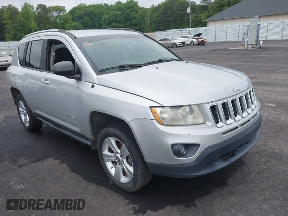 2012 Jeep Compass Sport with VIN 1C4NJCBA5CD622424, listed as a IAAI auction lot 42211700 with 120,945 mi miles and . Bid and sale history available at carsss.com. Image 1.